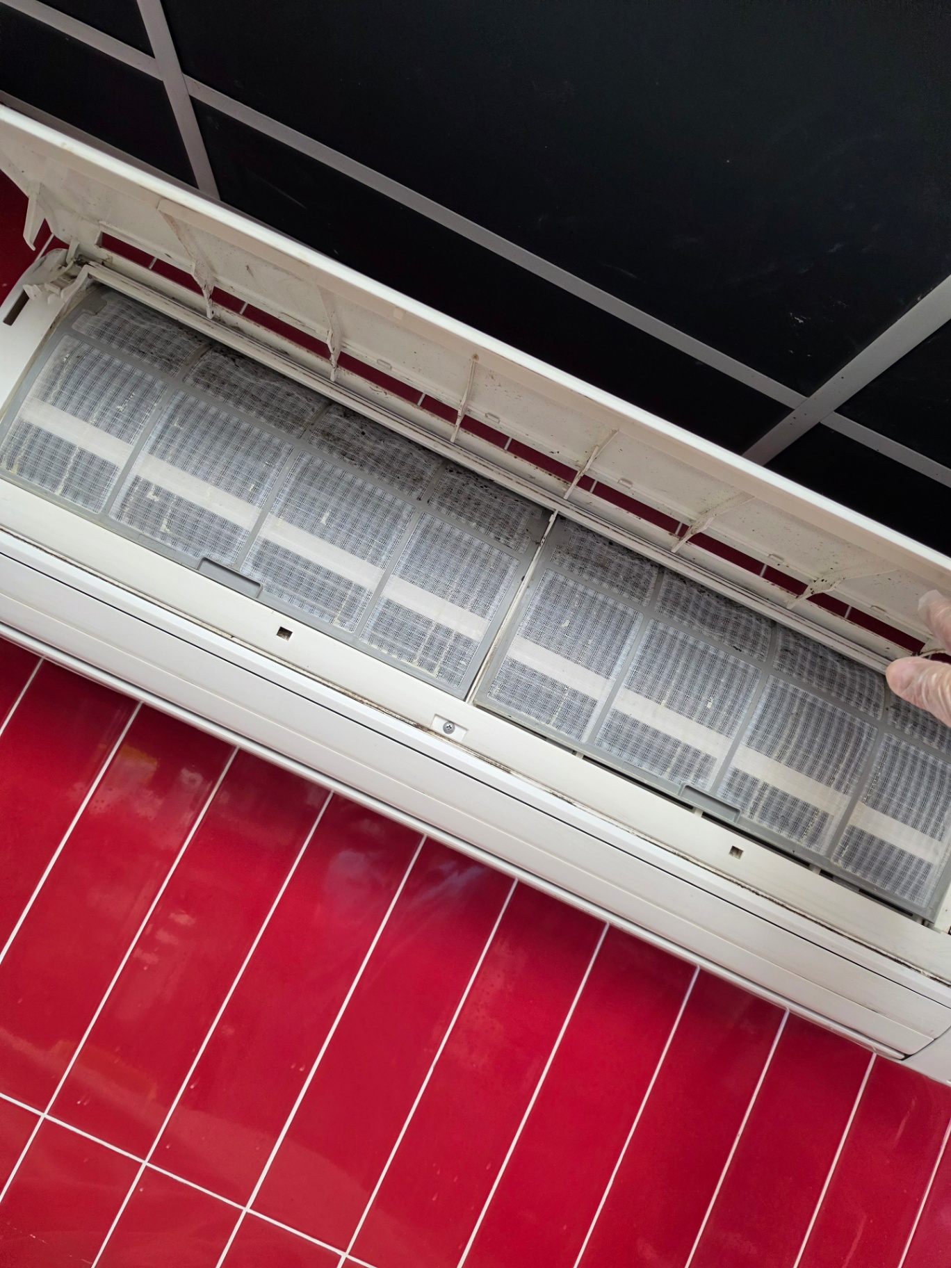 Wall mini split filter maintenance